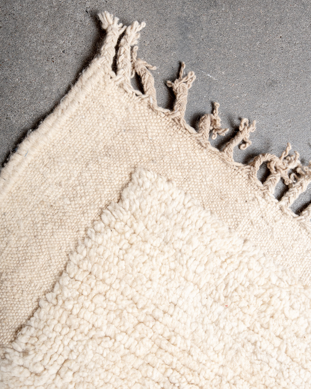 Modern, designer, handcrafted Berber rug from Morocco. Beniourain carpet with beautiful colours and patterns and fluffy wool texture.